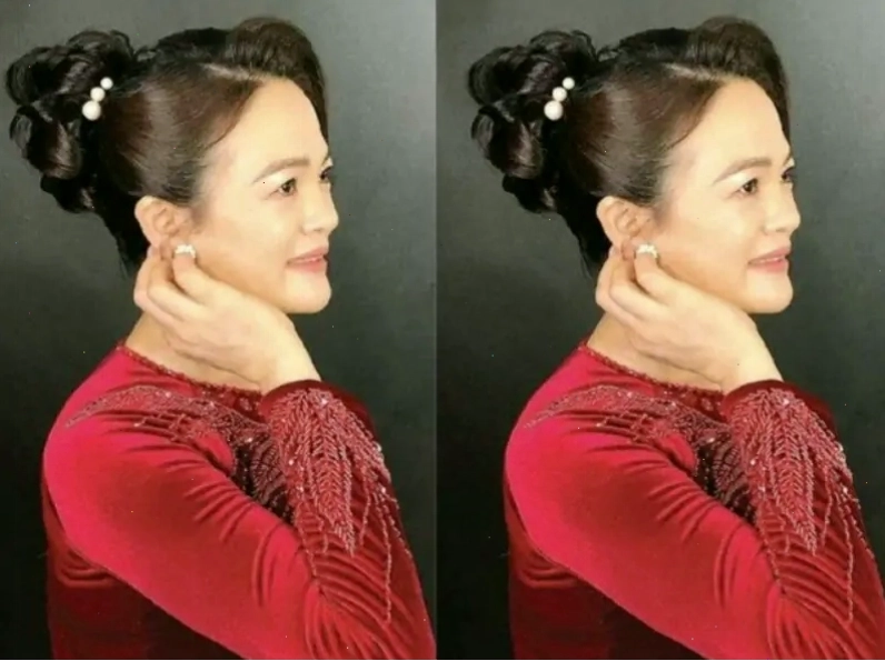 Kiểu tóc búi xoắn cao mang tới vẻ đẹp thanh lịch cho mẹ cô dâu