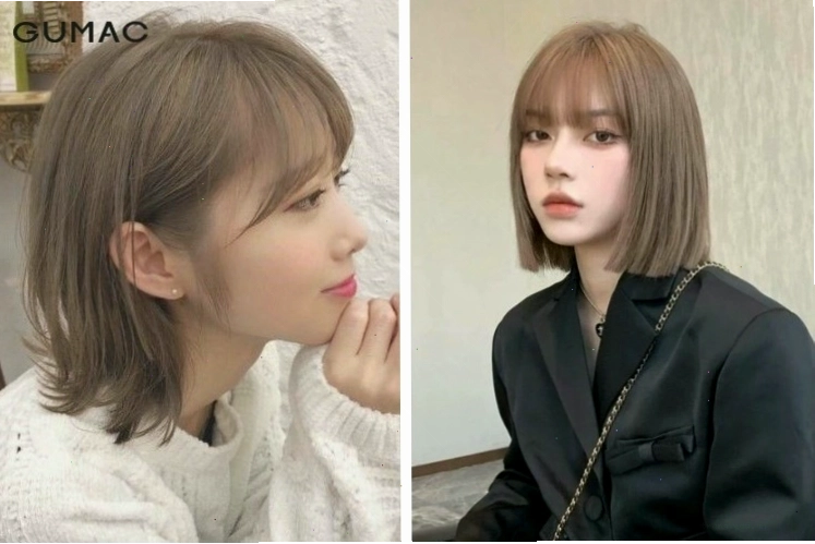 Người phụ nữ đang thoa mặt nạ ủ tóc cho mái tóc ngắn màu đen của mình