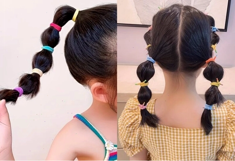 Tóc búi cao củ tỏi gọn gàng cho bé gái